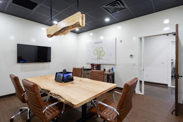 Conference Room with live edge solid wood table in office building